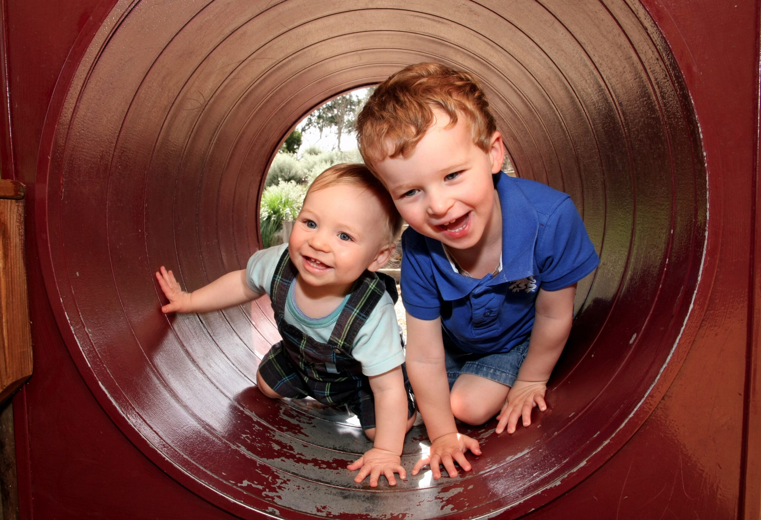Children playing inside tube
