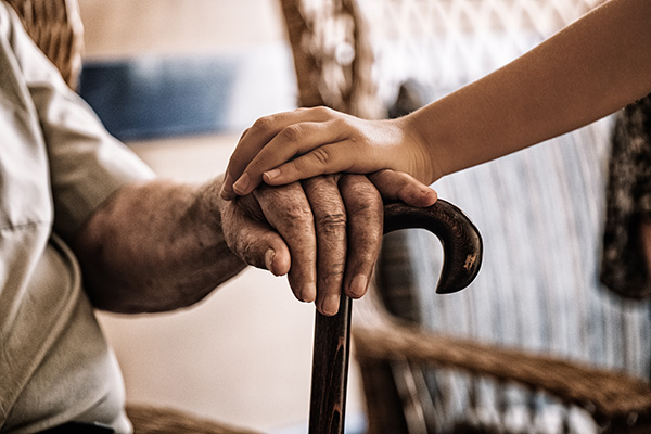 health care worker caring an elderly person